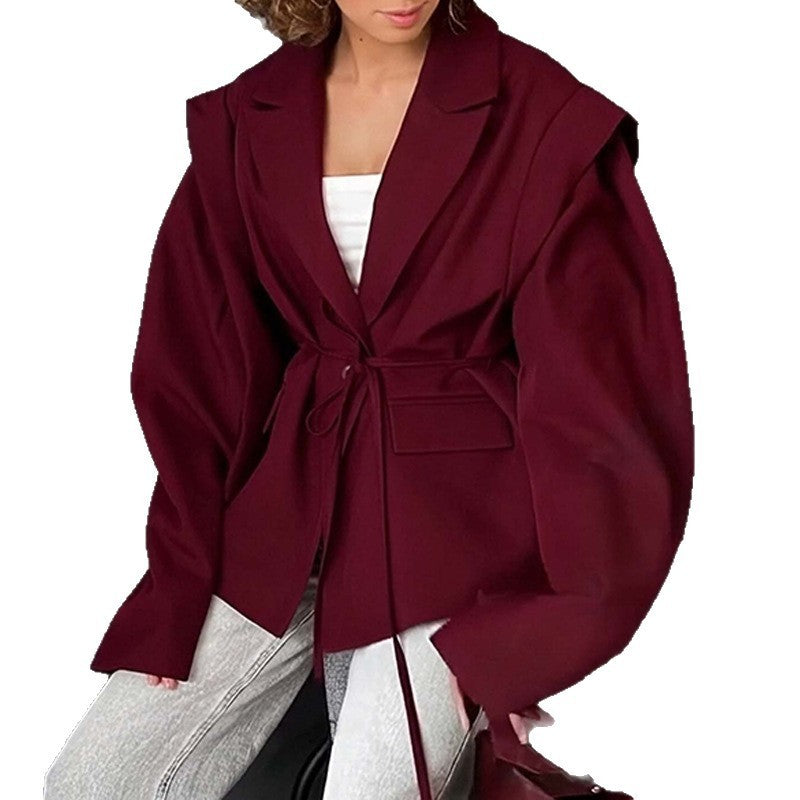 Blazer ample ceinturé à manches bouffantes – Élégance moderne et sophistiquée